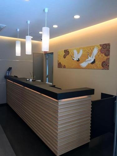 Фото Shinsaibashi Higashi Crystal Hotel