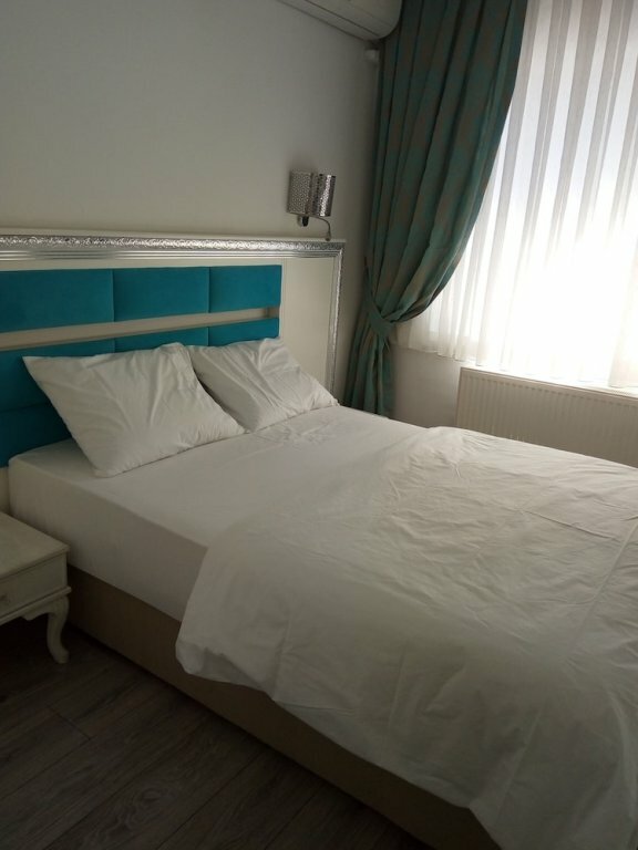 Гостиница Fish Gold Apart Suites в Фатихе