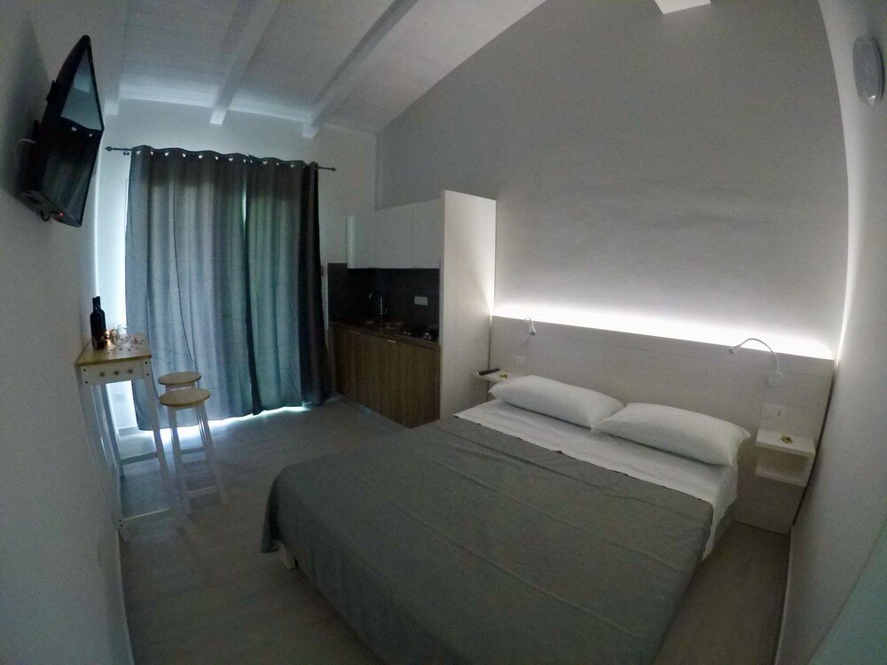 Фото Midenza Suites & Residence