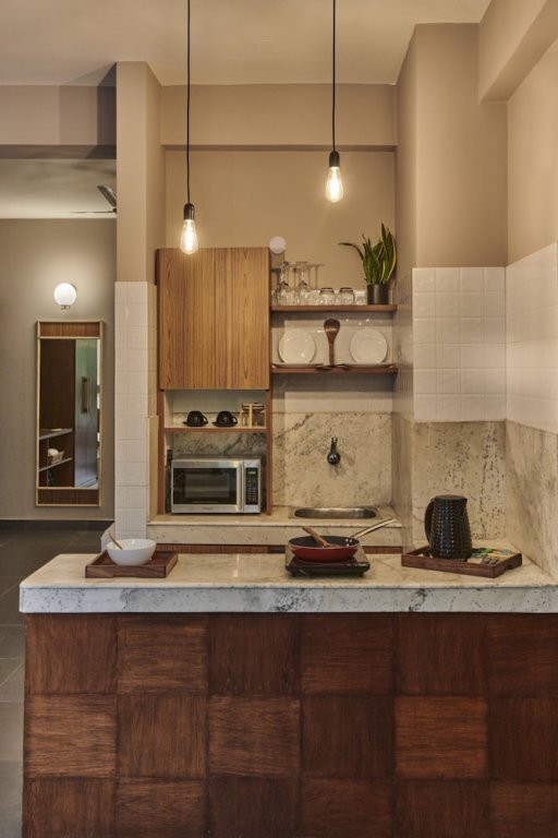 Фото Minimalist Poshtel & Suites