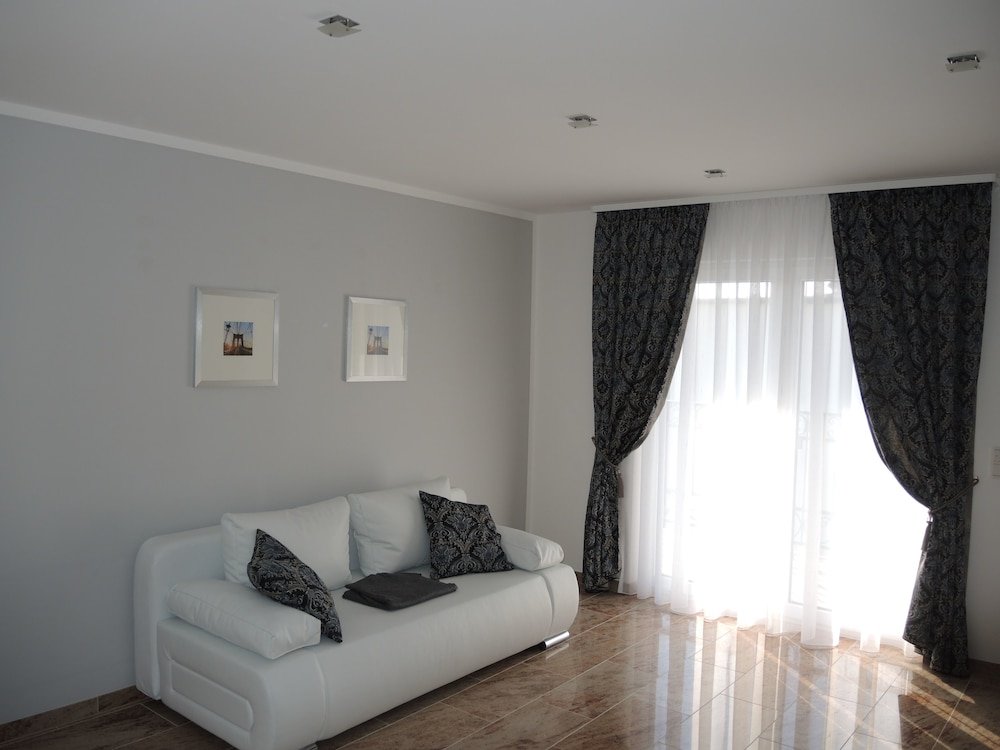 Фото Merkel Villa Apartamente