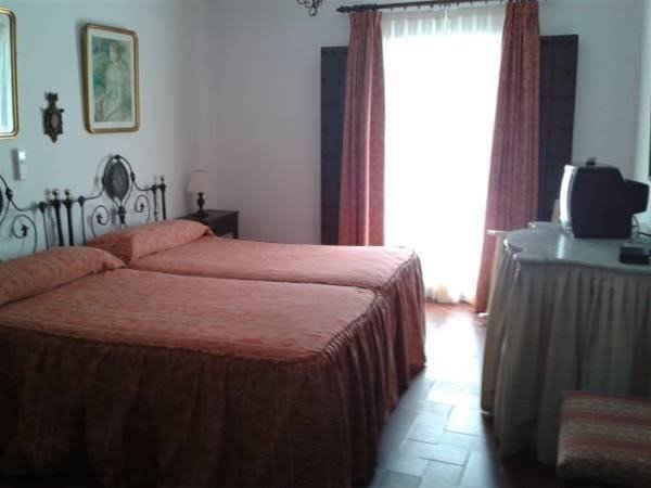 Фото Hostal Gran Capitan