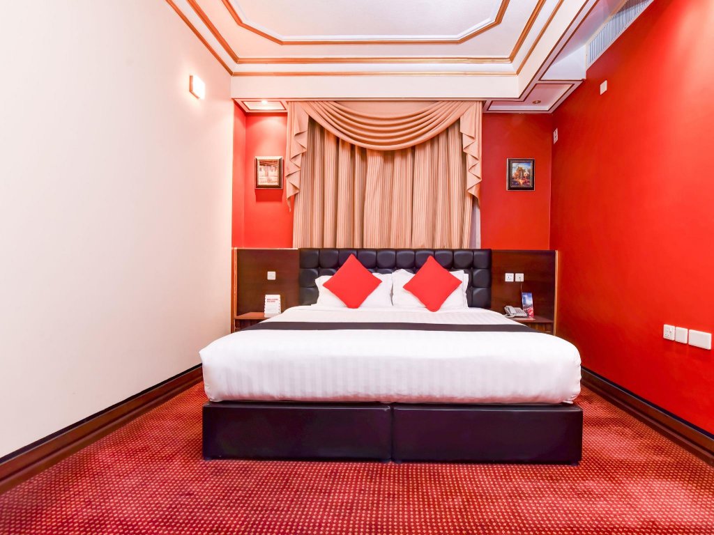 Фото Capital O456 Almansour Grand Hotel