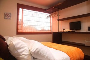 Гостиница Hotel Regency Suites La Feria