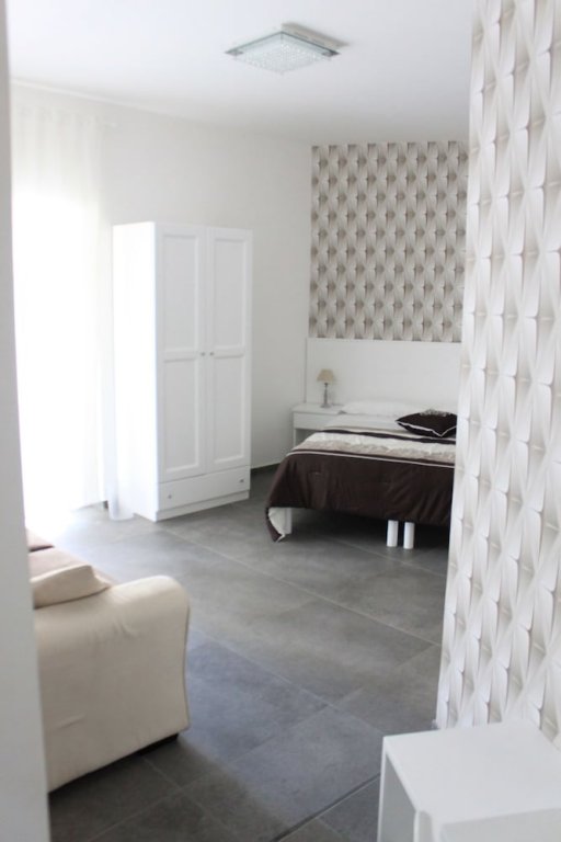 Фото Alambrado Rooms & Suites