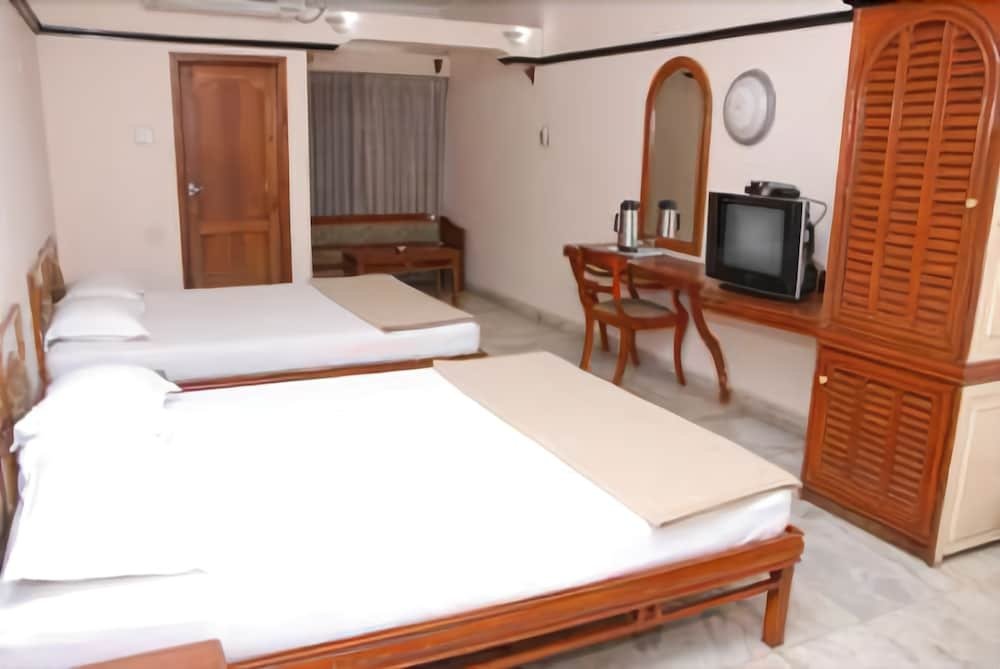 Фото Amogha International Hotel