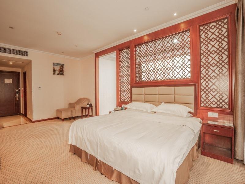 Фото GreenTree Inn Shaoxing Keqiao Xingyue Road Zhongqing Building Hotel