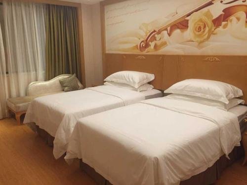 Фото Vienna Hotel Foshan Nanhai Avenue Branch