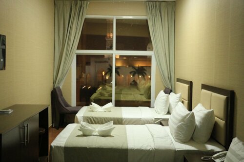 Гостиница Alpha Suites Hotel в Салале