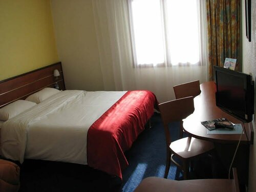 Гостиница Brit Hotel Nantes Vigneux - L'Atlantel