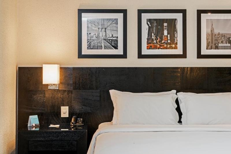 Фото Rockefeller by Slaviero Hotéis