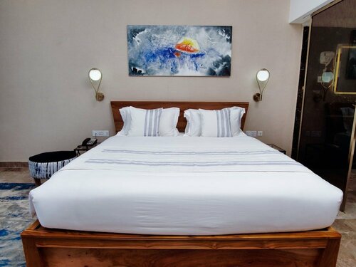 Гостиница Hotel Petit Brussel в Ломе
