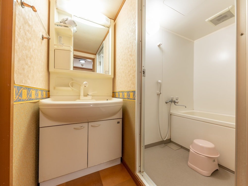 Фото Nishikawaguchi Station Hotel Stay Lounge