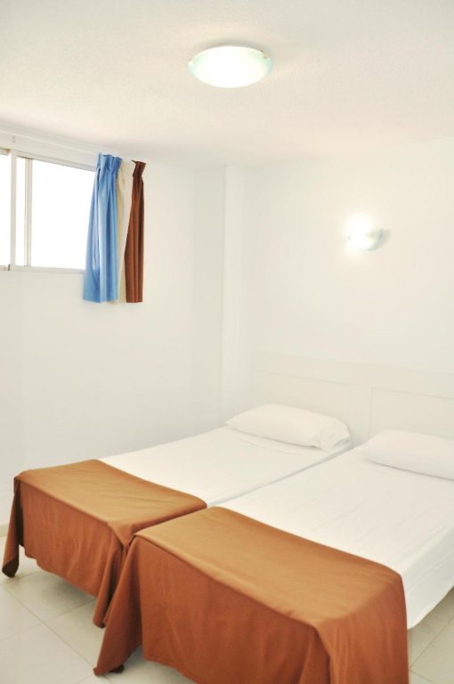 Фото Comodoro Apartments