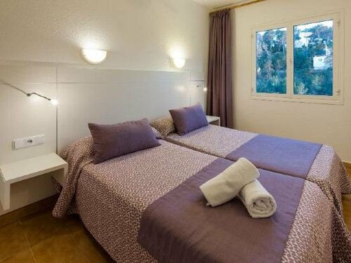 Гостиница Aparthotel Puerto Cala Vadella в Сан-Хосе