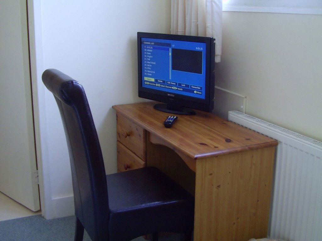 Фото Swiss Cottage Bed And Breakfast