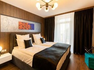 Гостиница Bach Apartments