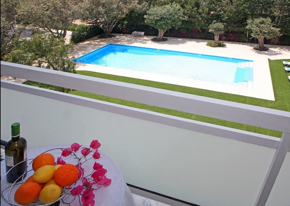 Фото Corina Suites and Apartments