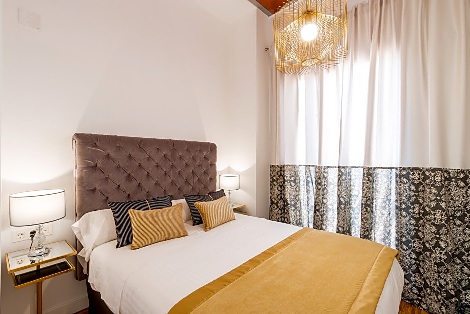 Фото Oro Del Darro Suites