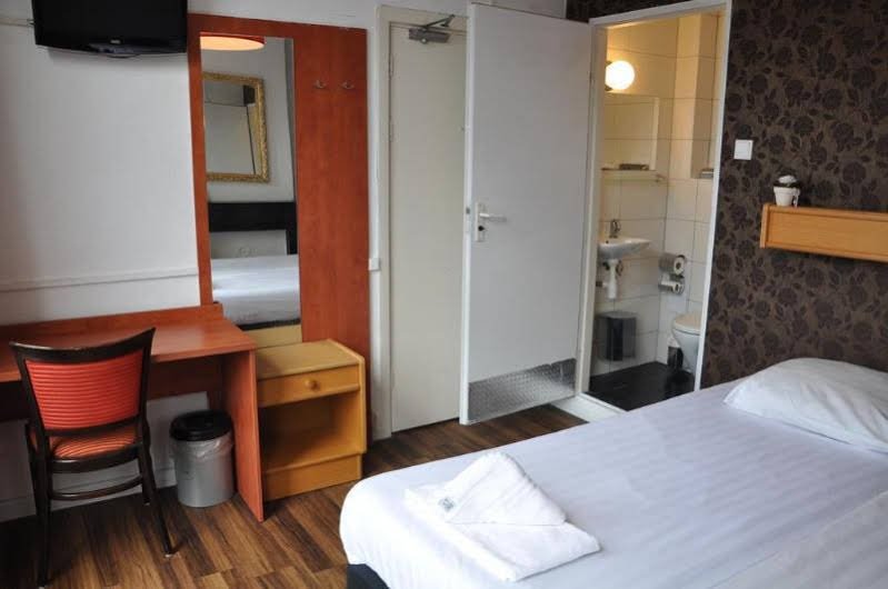 Фото Amsterdam Inn Hotel