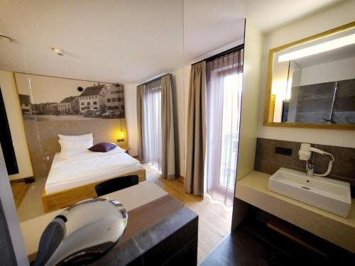 Фото Stadthotel Kachelofen