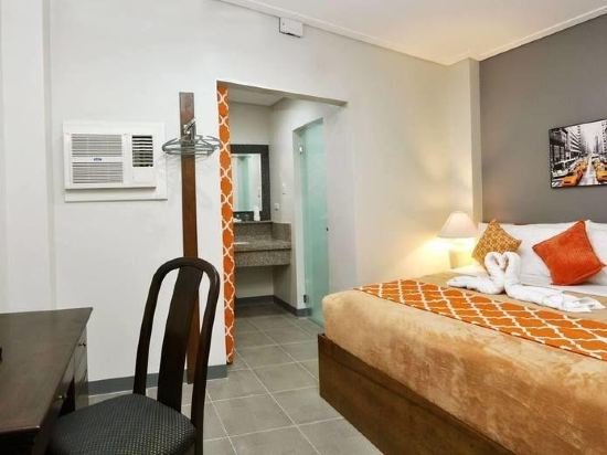 Фото 717 Cesar Place Hotel