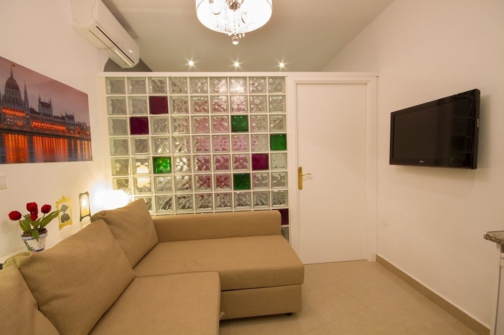 Фото Apartamentos El Templo Suites