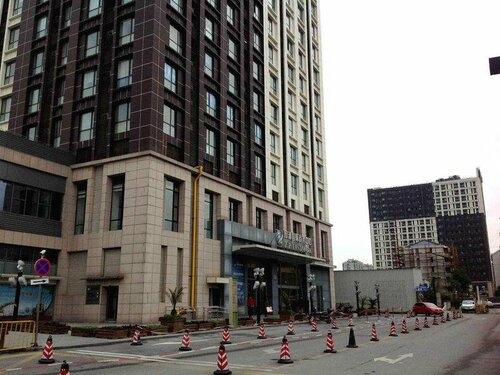 Апартаменты Shanghai Zhoupu Suju Serviced Apartment @ Disney Land в Шанхае