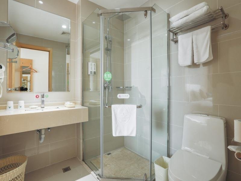 Фото GreenTree Inn Zhangjiagang Yangshe Old Street Stadium