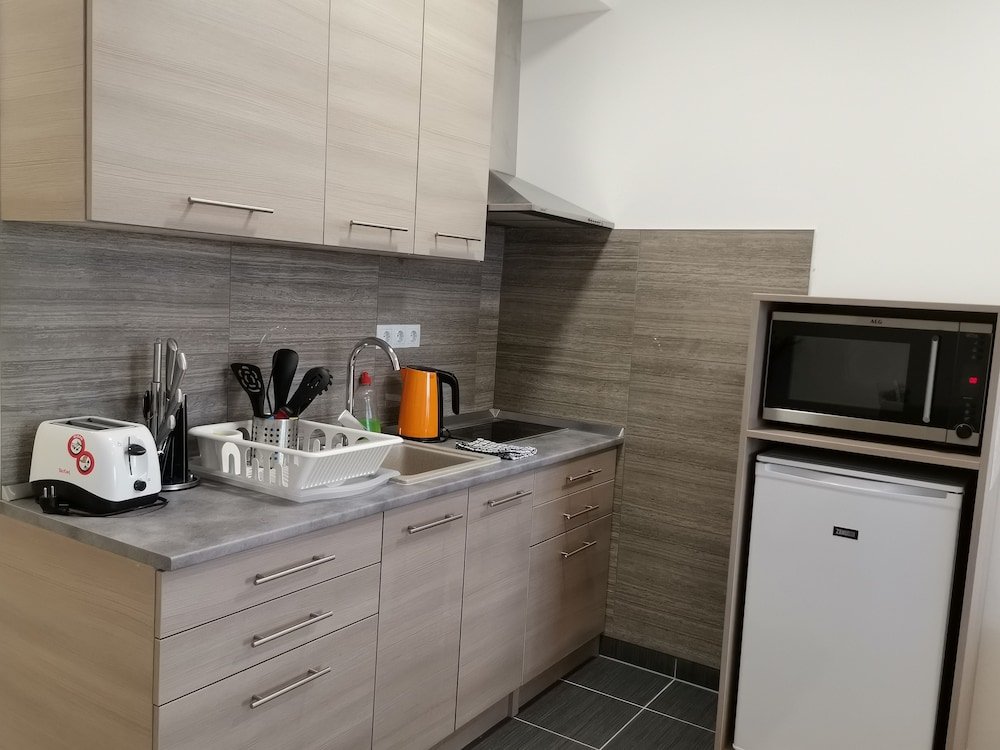 Фото Corvin Holiday Apartment Hotel