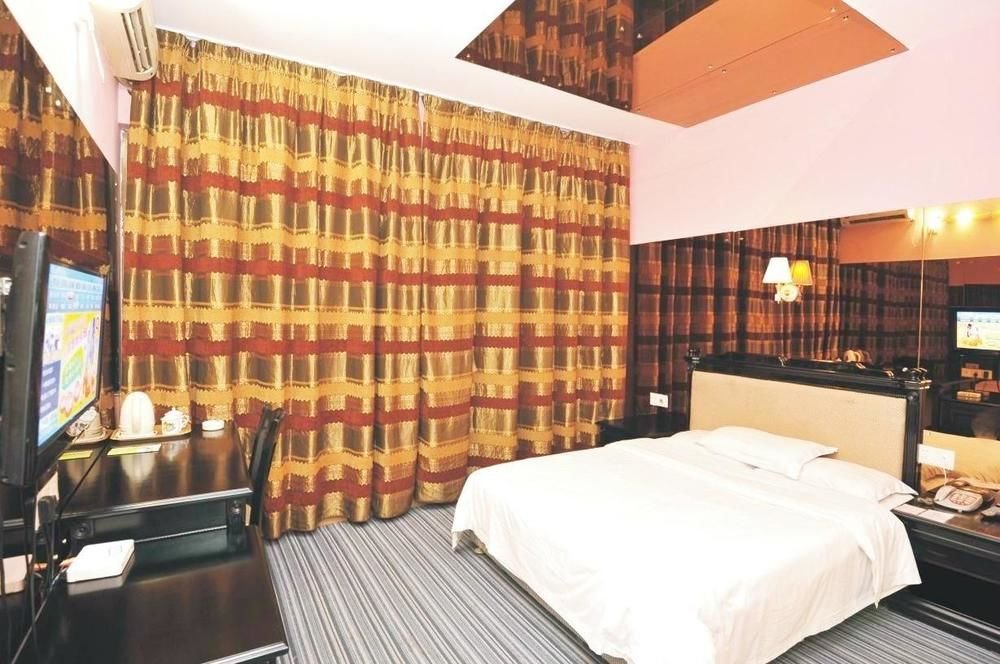 Фото Tengda Businss Hotel - Zhuhai