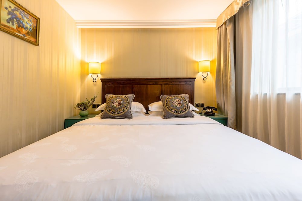 Фото Wuyang Boutique Hotel - Hefang Street