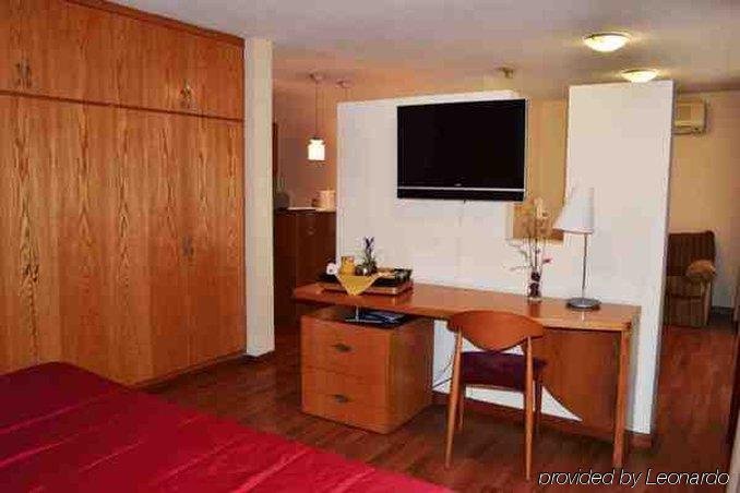 Фото Armon Suites Hotel