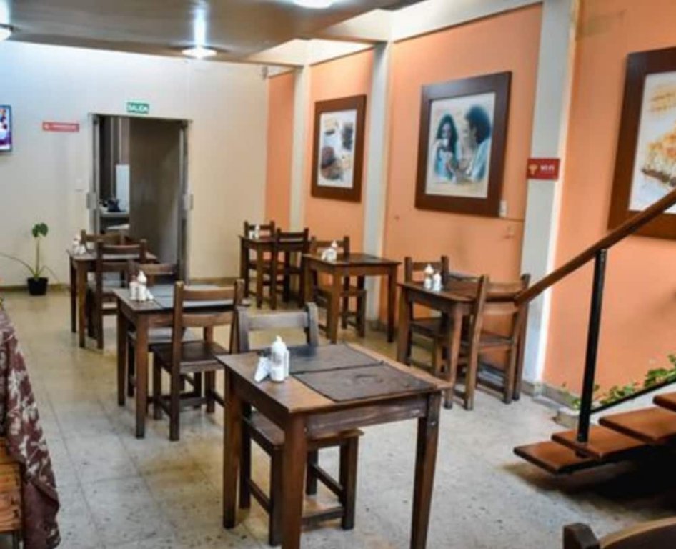 Фото Casi Guemes Hotel