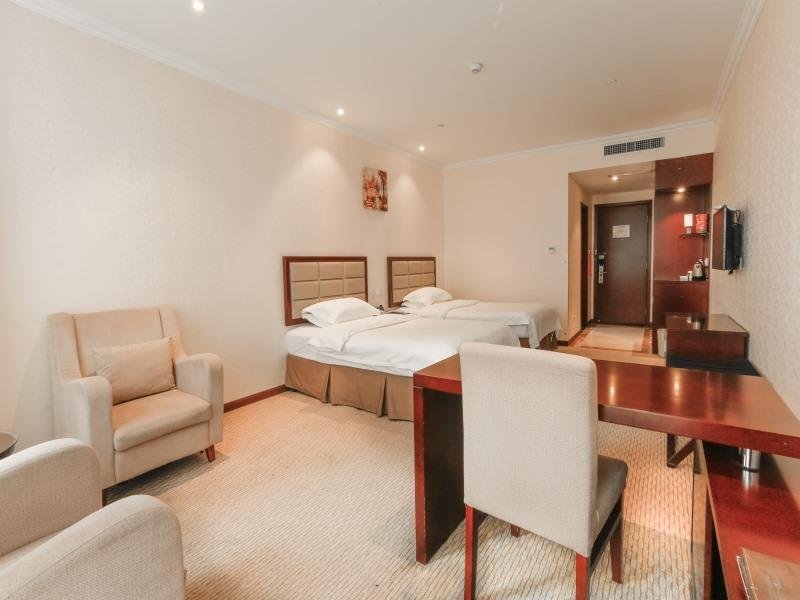 Фото GreenTree Inn Shaoxing Keqiao Xingyue Road Zhongqing Building Hotel