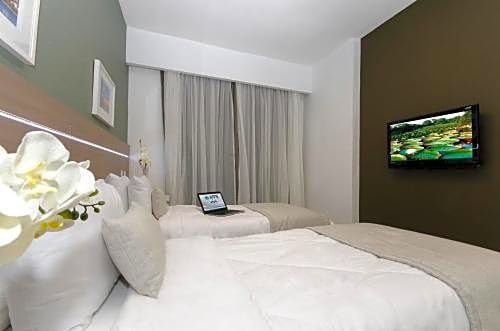 Фото Hotel Adrianópolis All Suites