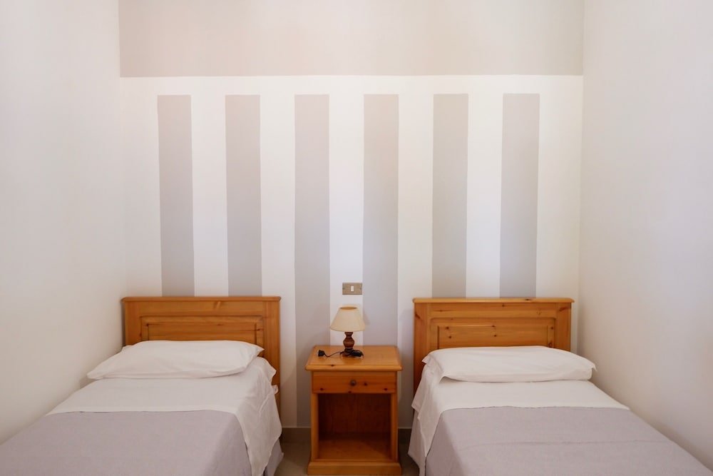 Фото Midenza Suites & Residence