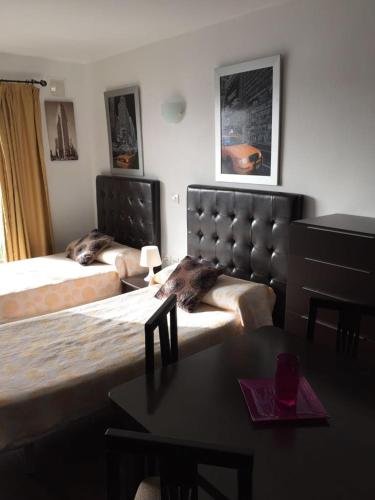 Фото Comodoro Apartments