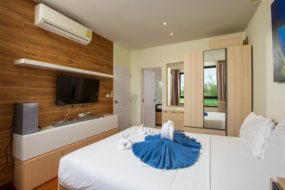 Фото The Lago Apartments by Tropiclook