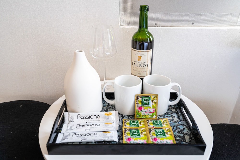 Фото Winsuites Saigon Hotel