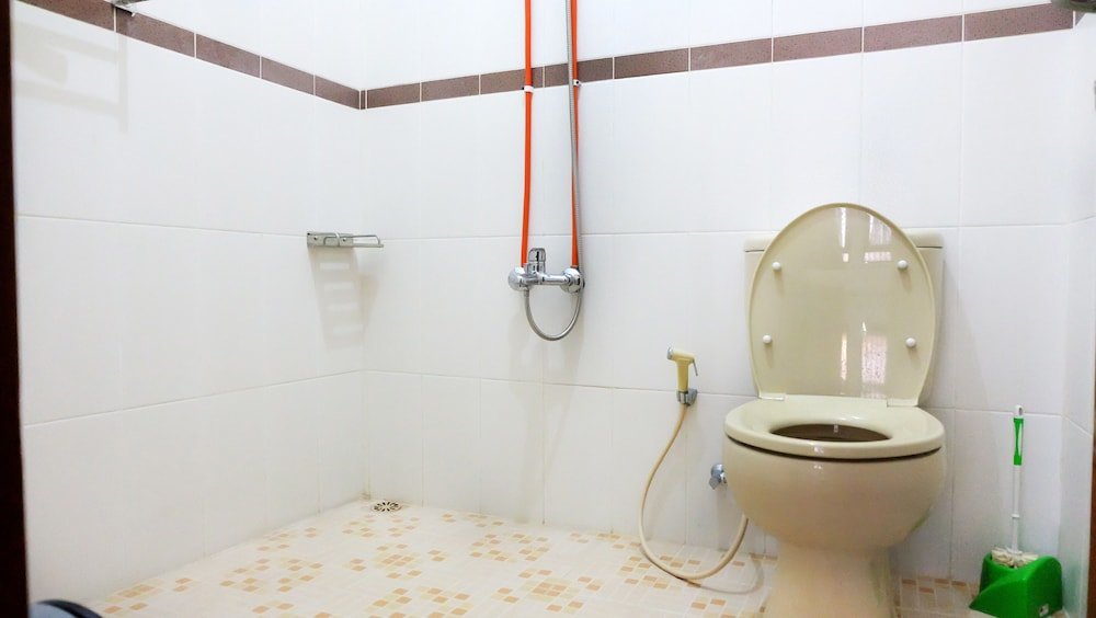 Фото Simply Homy Guest House Unit Bintaran