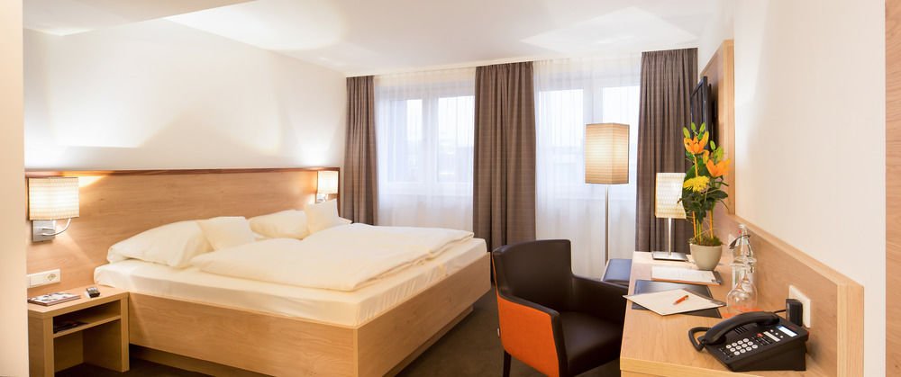 Фото Stadthotel am Römerturm