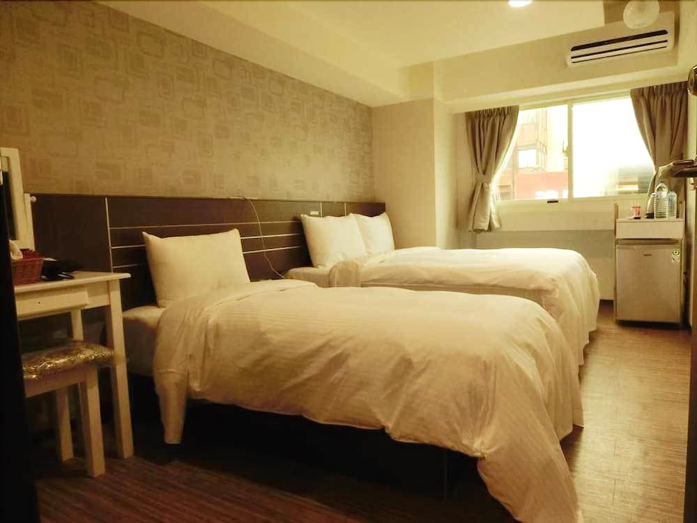 Фото Jhong-Sing Hotel