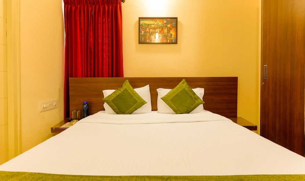 Фото Treebo Trend Mel's Suites Indiranagar