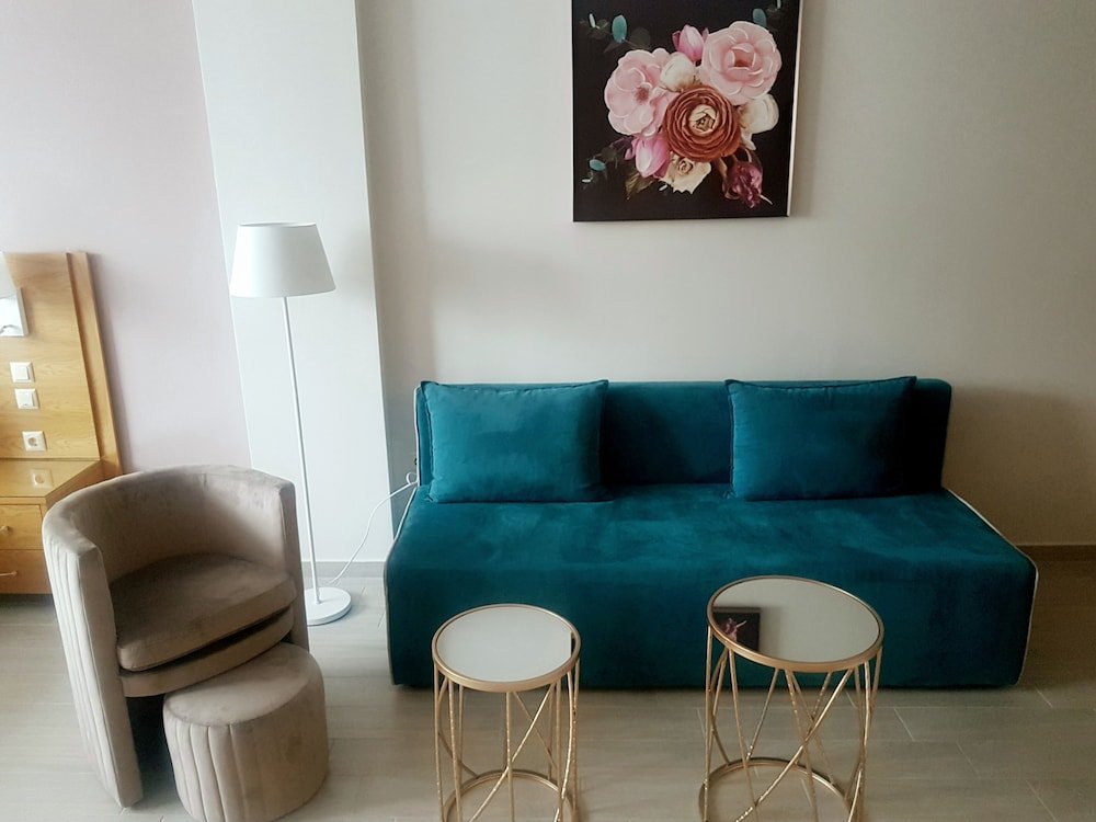 Фото La Place De La Gare Suite