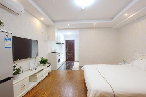 Фото Weihai You Gang Vacation ApartHotel
