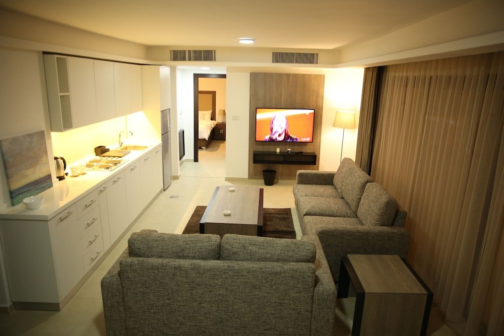 Фото Triple A Hotel Apartments