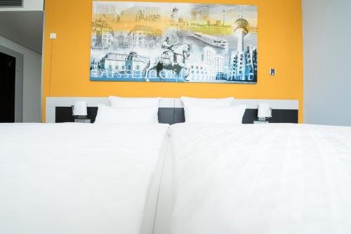 Фото Carathotel Düsseldorf City