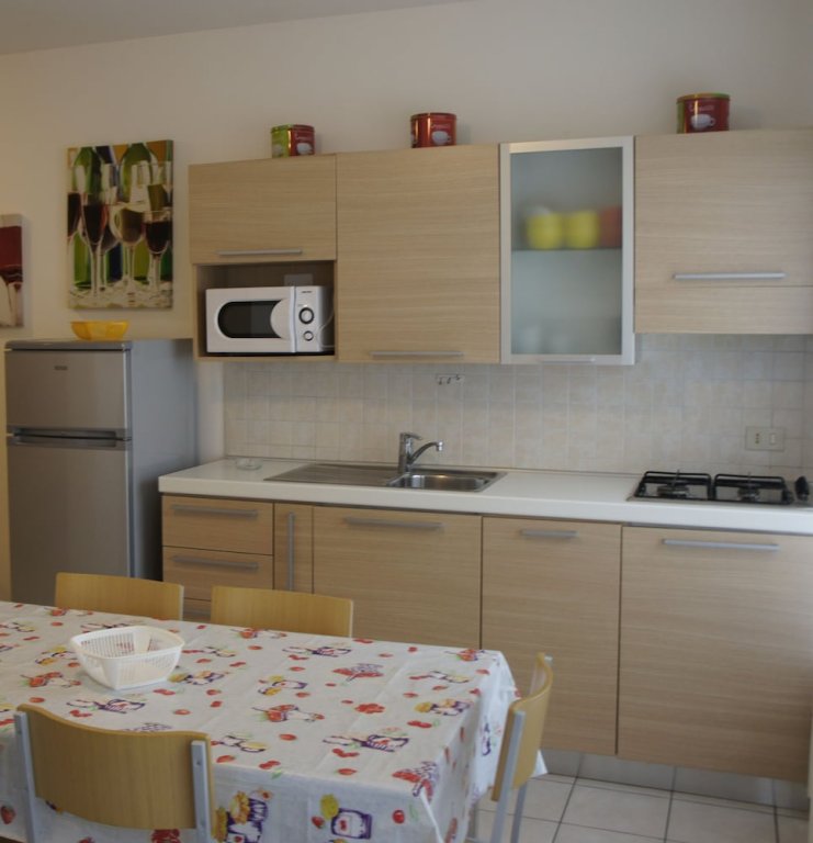 Фото Appartamenti Aquamarina