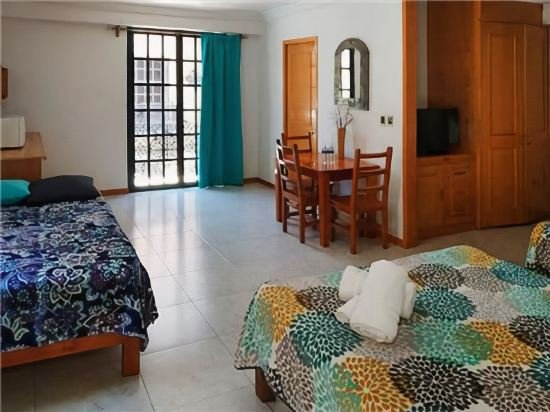 Фото Suites Sevilla